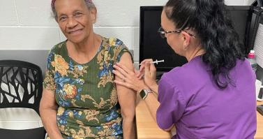 A patient receives a COVID-19 vaccine at Cairns West Medical Centre