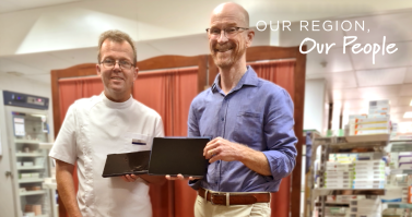 Pharmacist Stephen Hall and David Griffiths (right) from Griffiths Pharmacy in Charter Towers with new iPads